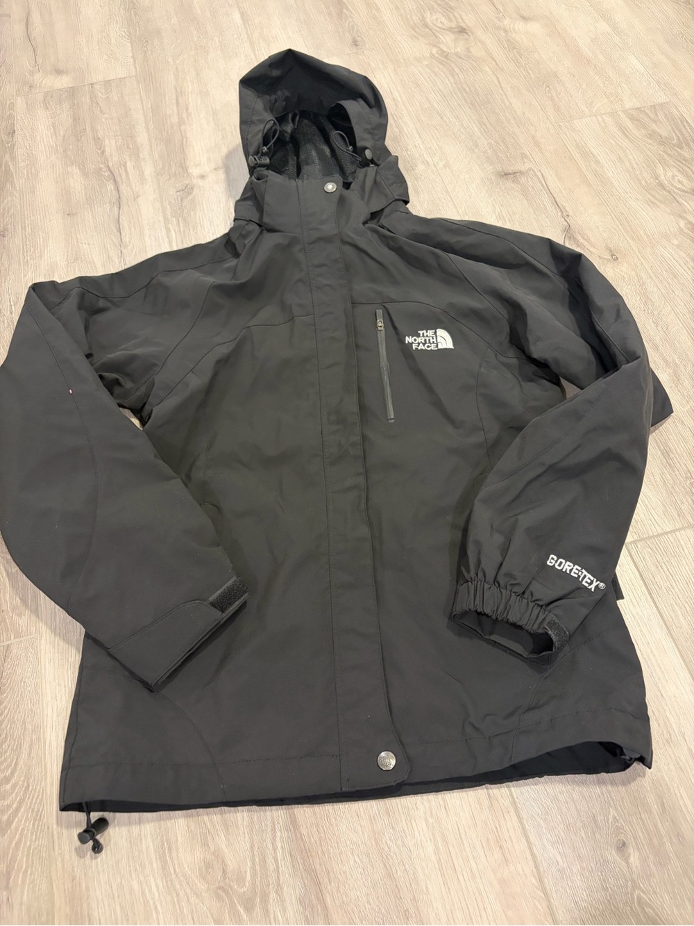 The North Face woman’s Black GORE-TEX Hooded Jacket